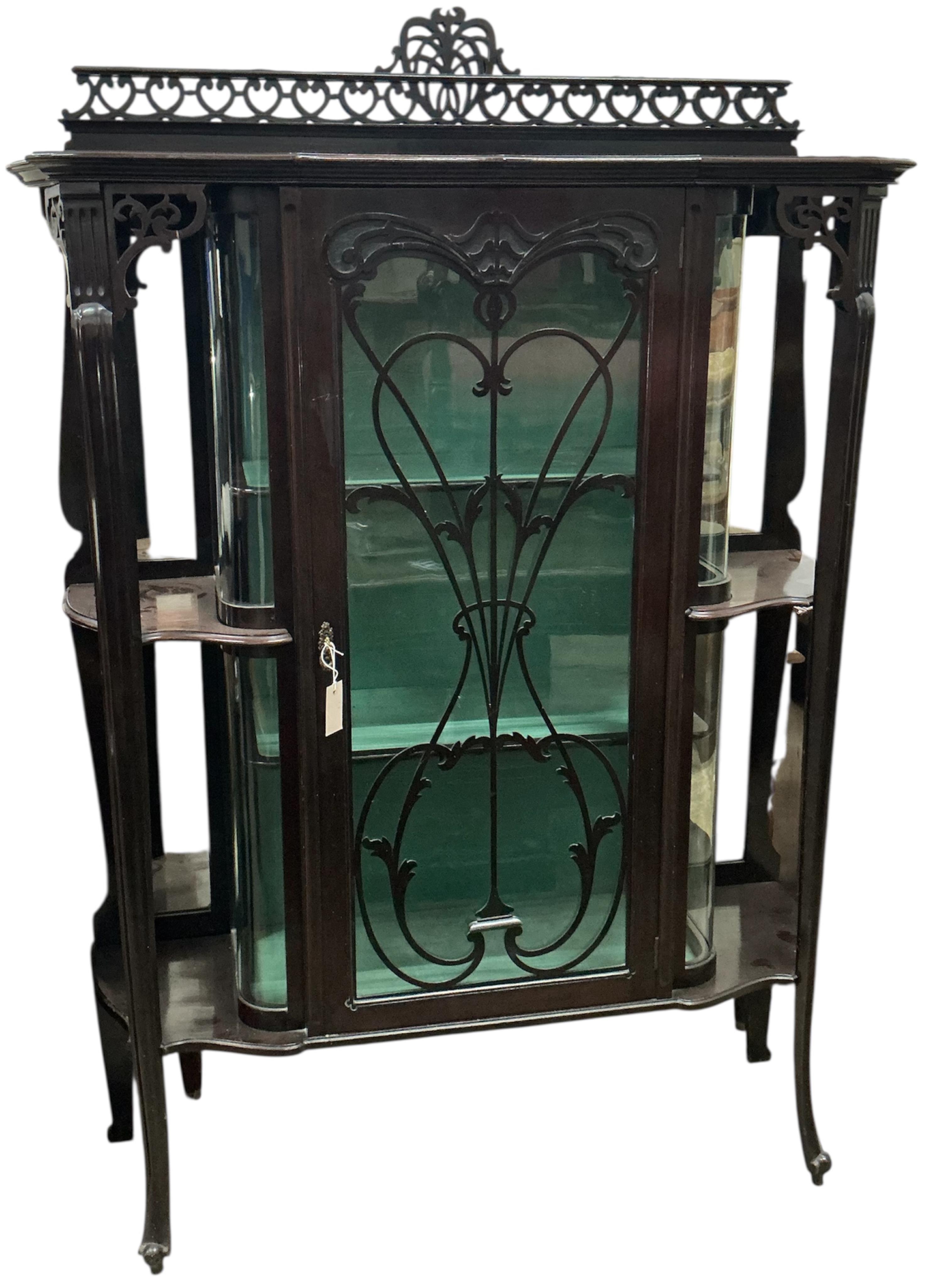 A late Victorian mahogany display cabinet, width 126cm, depth 38cm, height 182cm